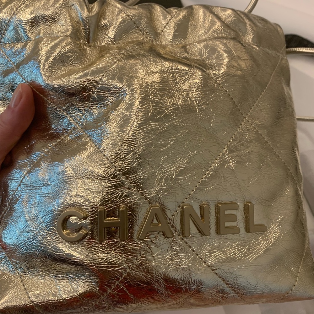 Brand new, limited edition rare /collectible authentic Lancôme Chanel gold purse